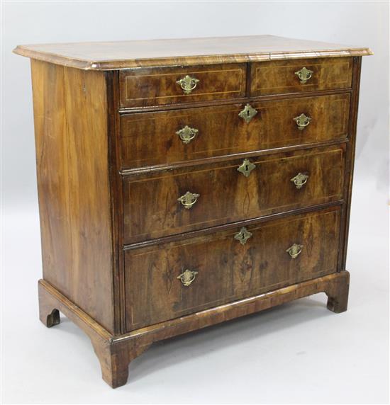 A George II walnut chest, W.3ft 5in. D.1ft 9in. H.3ft 1in.